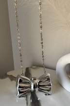 Viral Mini Silver Bow Clutch
